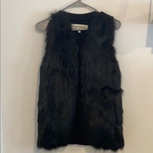 black faux fur vest